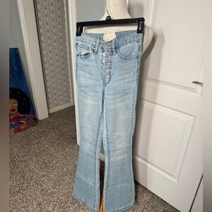 Altar'd State Light Blue Flared Women Jeans in size 24/0
Acid washed with heart